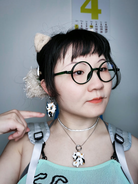 Calico cat, Caterpillar necklace, Earring with ears,  Unique jewelry, Cat-themed accessories,  Statement necklace,  Cute earrings,  Animal-inspired jewelry,  Whimsical accessories, Fashionable cat jewelry,