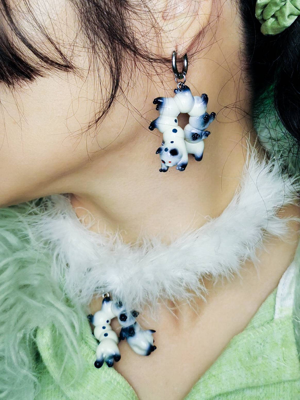 Seal point cat caterpillar necklace and earring with porcelain colors.