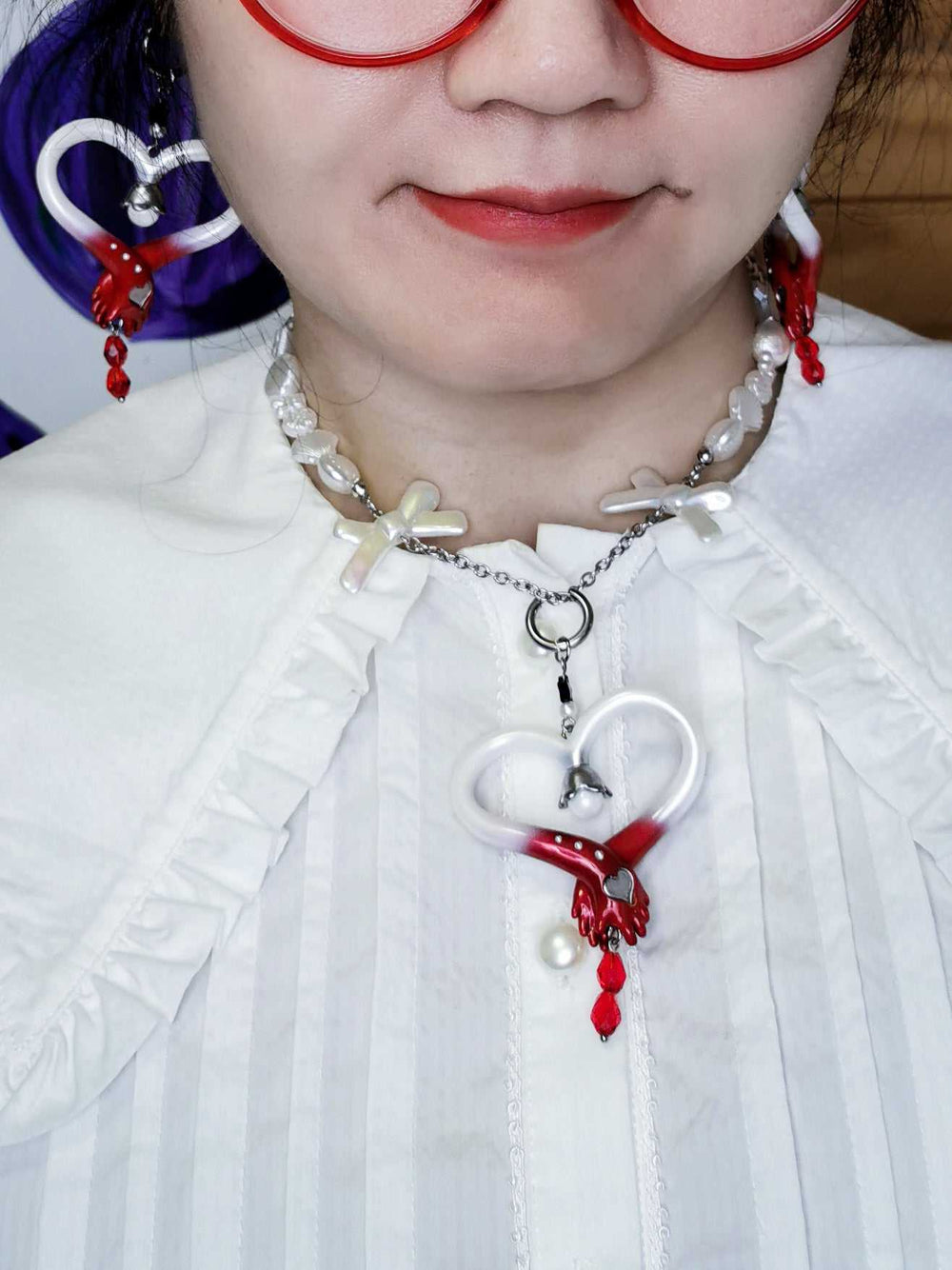 Blood-red pearl witch's wand necklace & earring set featuring hand jewelry design with polyurethane resins and titanium steel elements.