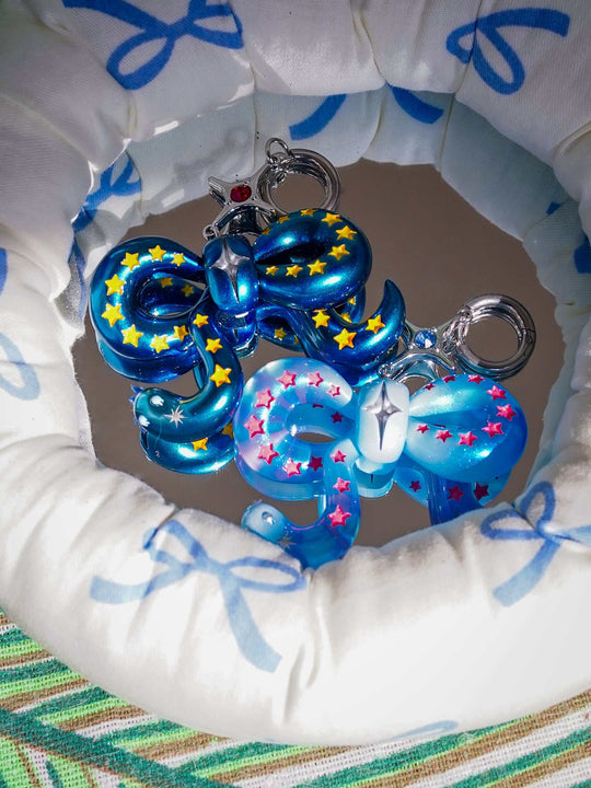 Ice blue snake bowtie necklace and earring with pink stars and felt tongue accessory