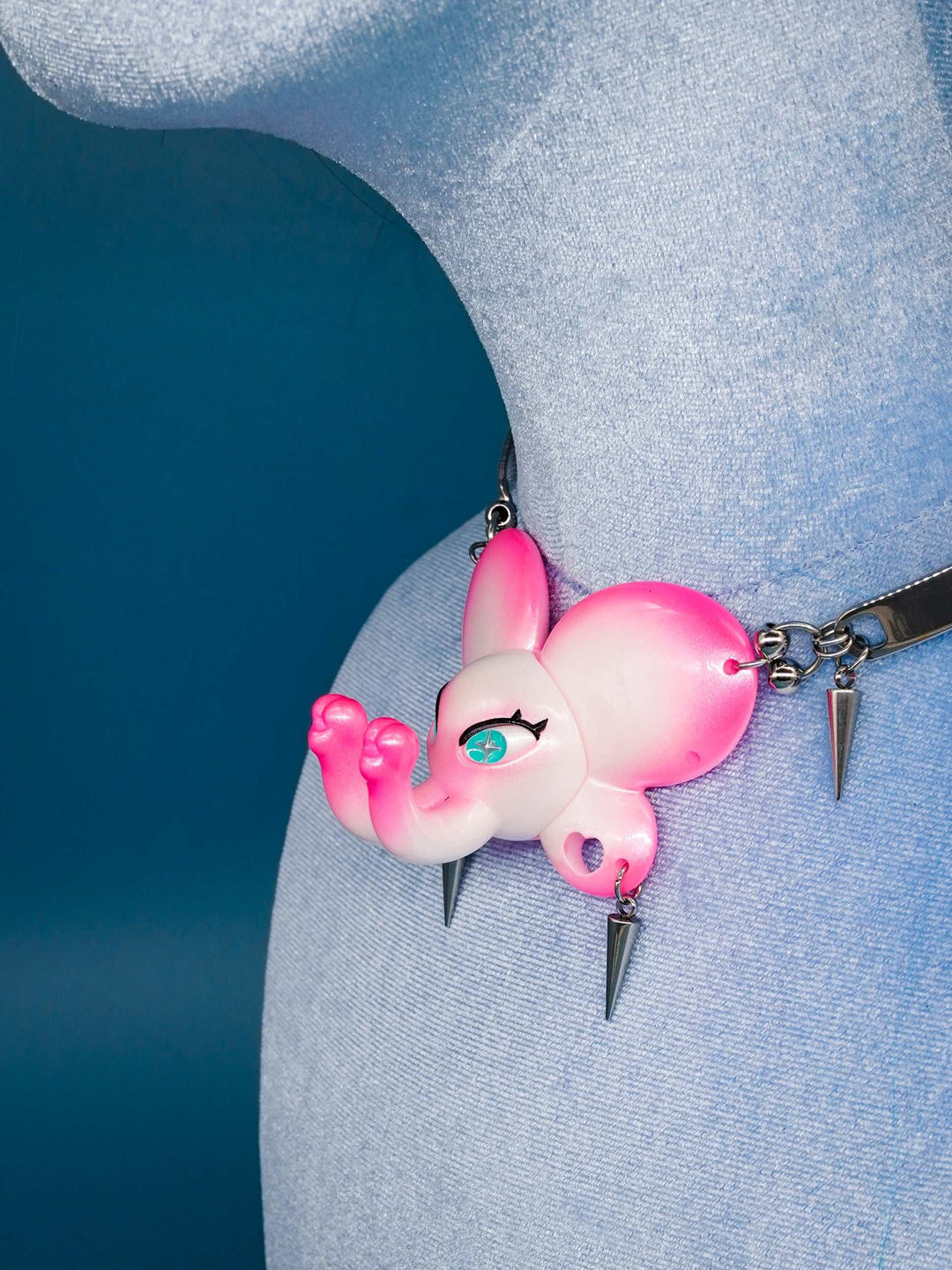 Twin-Trunk Diva Elephant Necklace in pink pearl white with two trunks and blue-green star pupils
