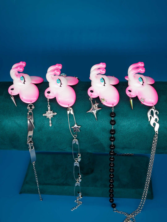 Twin-Trunk Diva Elephant Necklace in pink pearl white with two trunks and blue-green star pupils