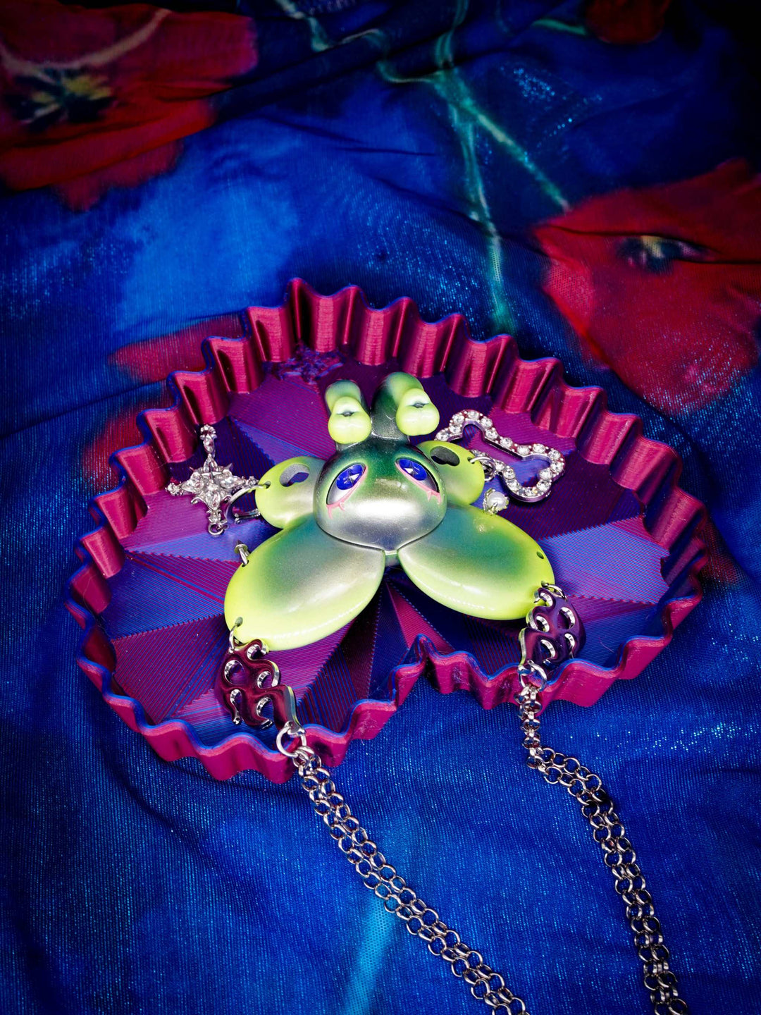 Twin-Trunk Diva Elephant Necklace in alien apple green with two trunks and starry eyes