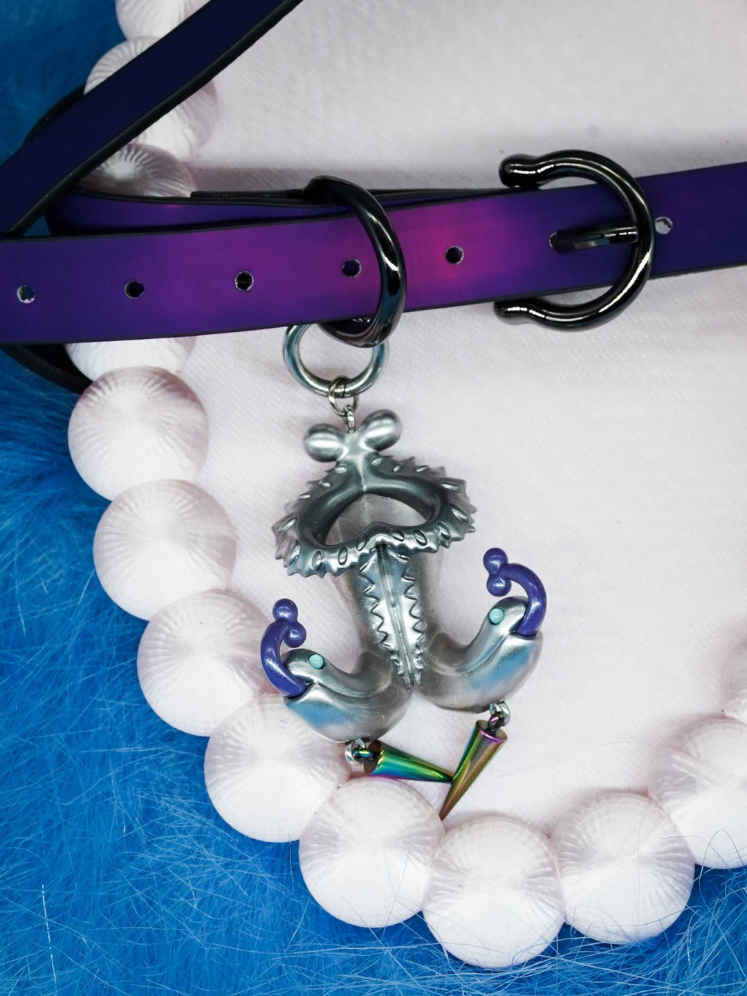 Twin-Headed Pitcher Serpent Earrings with violet tendrils and silver-toned serpent heads
