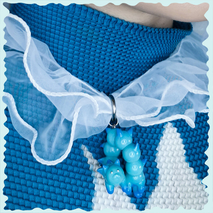 Turquoise and Blue Catcaterpillar Jewelry Set, Whimsical Catcaterpillar Necklace and Earring, Colorful Earring and Necklace Ensemble, Cute Turquoise Catcaterpillar Accessories, Catcaterpillar Pendant with Lots of Ears, Blue and Turquoise Fantasy Jewelry, Unique Catcaterpillar Necklace and Earring Set, Playful Animal-themed Jewelry Collection, Quirky Turquoise and Blue Charm Set, Imaginative Catcaterpillar Fashion,