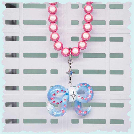 Ice blue snake bowtie necklace with pink stars and laser bead chain