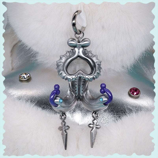 Twin-headed pitcher serpent earrings with violet tendrils and silver metallic details