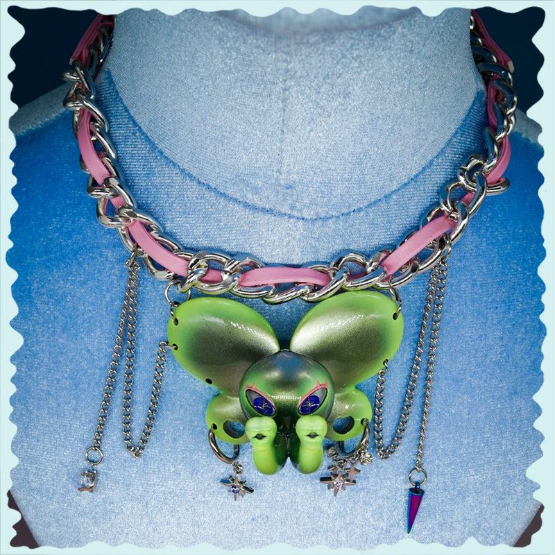 Twin-Trunk Diva Elephant Necklace Alien Apple Green metallic elephant with two trunks and starry eyes