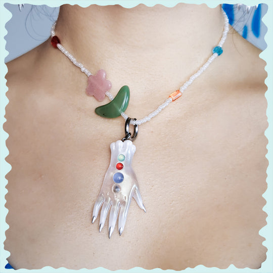 The colorful white fairy goblin hands earring, necklace & hairclips